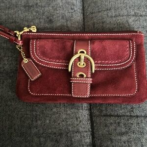 Coach burgundy wristlet